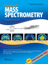 Induction of protein conformational change inside the charged electrospray droplet